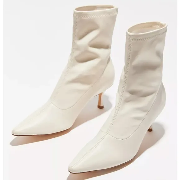 • urban outfitters creamy slim pointed toe faux leather boots •