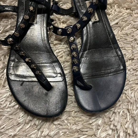Balenciaga leather sandals with metal studs on the straps.