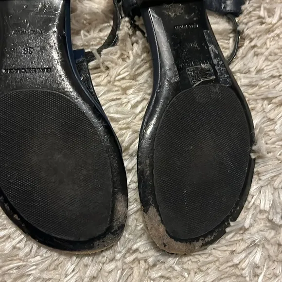 Balenciaga leather sandals with metal studs on the straps.
