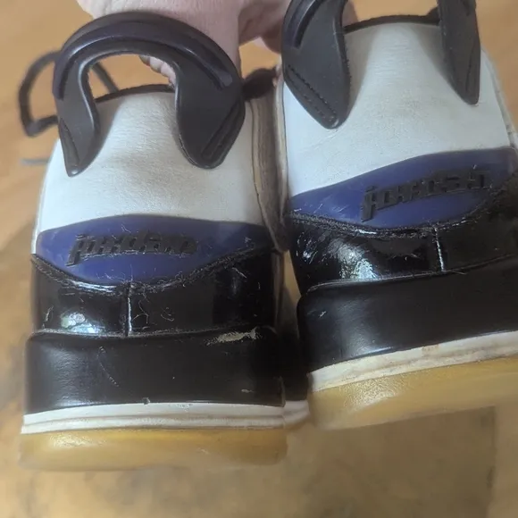 Black and White Sneakers with Blue Accents