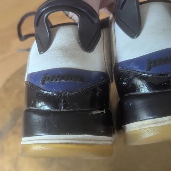 Black and White Sneakers with Blue Accents