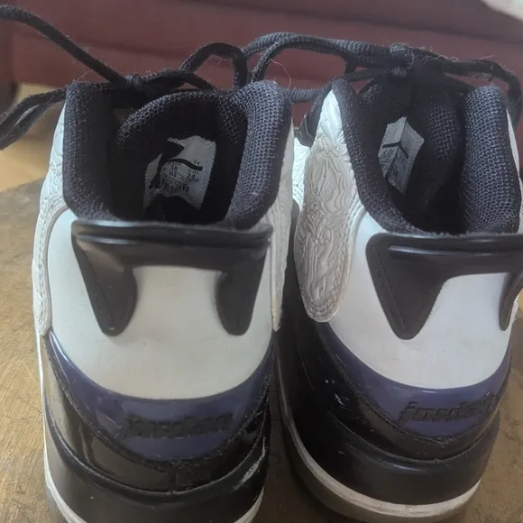 Black and White Sneakers with Blue Accents