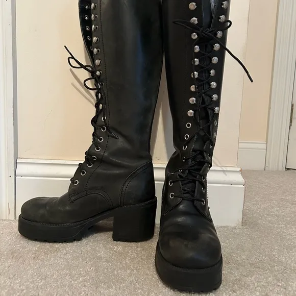 Black Combat Boots with Knee-High Design and Chunky Sole