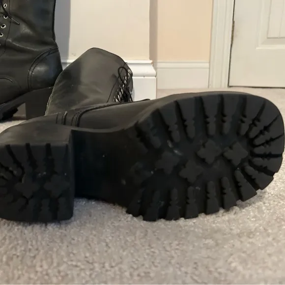 Black Combat Boots with Knee-High Design and Chunky Sole