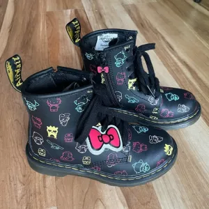 Dr. Martens Hello Kitty Chunky Black Moto Boots with Colorful Print Childs 12