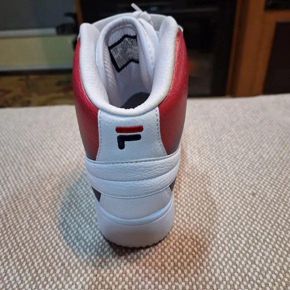 Fila A High Tops men's size 7.5 NWOT. White with red ombre accent.