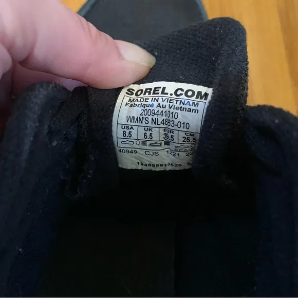 Sorel black and white sneakers size 8.5