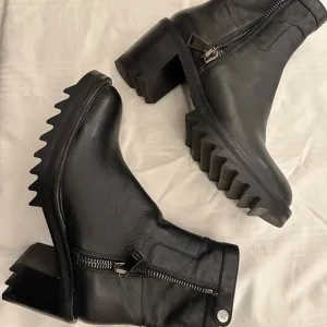 Tamara Mellon Black Heeled Boots with Lug Sole