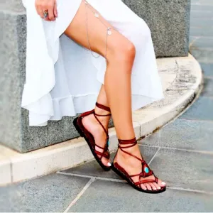 Turquoise stone leather sandals.