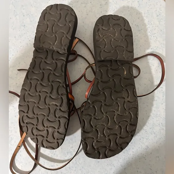 Turquoise stone leather sandals.